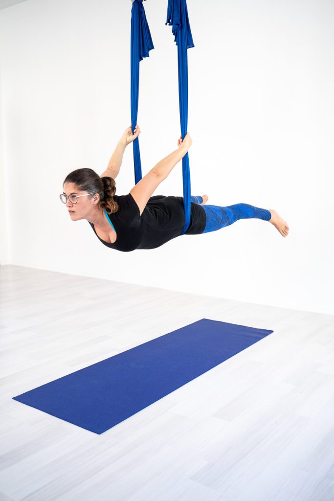 Woman Doing Antigravity Fly Aerial Yoga Positions In Hammock Stock Photo -  Download Image Now - iStock